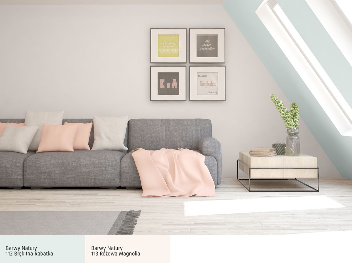 Szara sofa z pastelowymi poduszkami w nowoczesnym salonie.